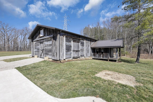 exterior space with an outbuilding