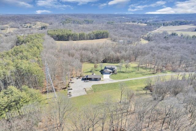 drone / aerial view with a rural view and a wooded view