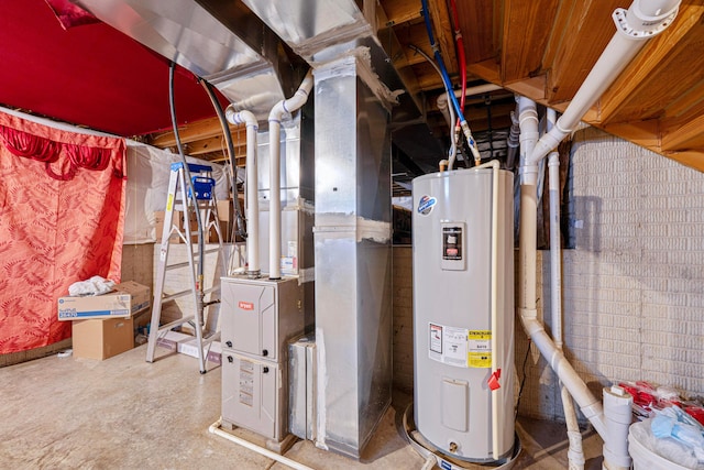 utility room featuring water heater