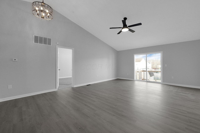 unfurnished living room with visible vents, baseboards, dark wood-type flooring, and ceiling fan with notable chandelier