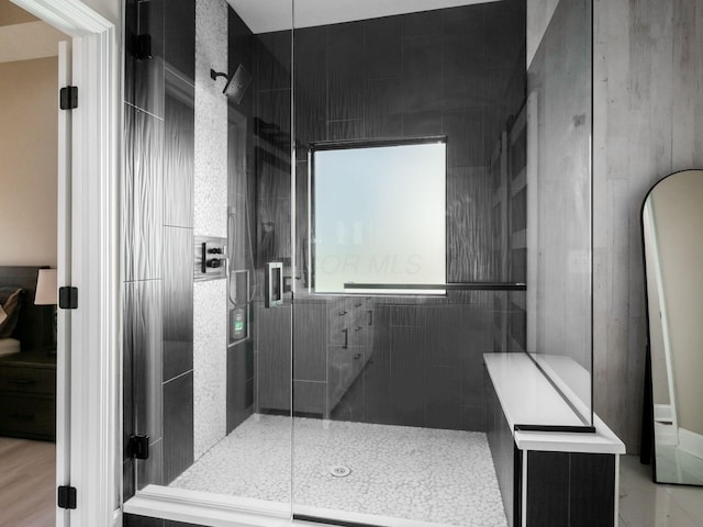 bathroom with a shower stall