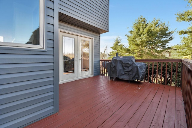 wooden terrace with grilling area