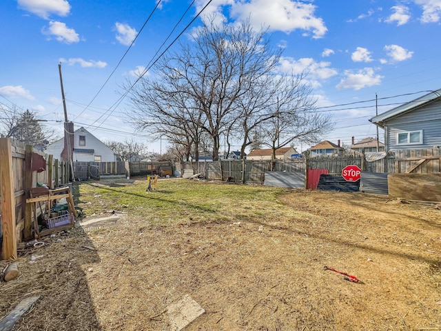 view of yard featuring a fenced backyard