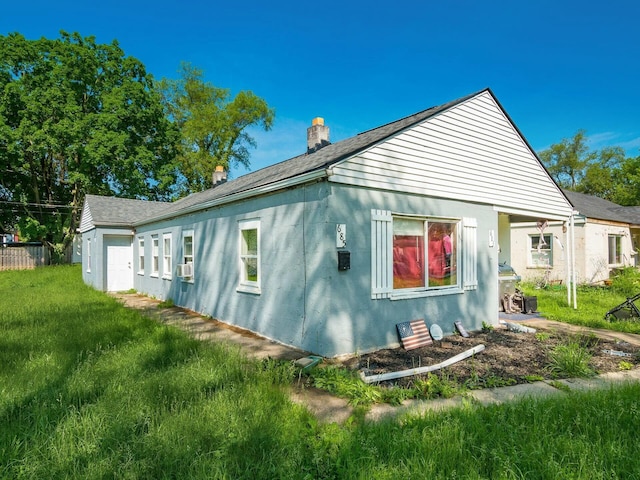 view of side of home with a chimney