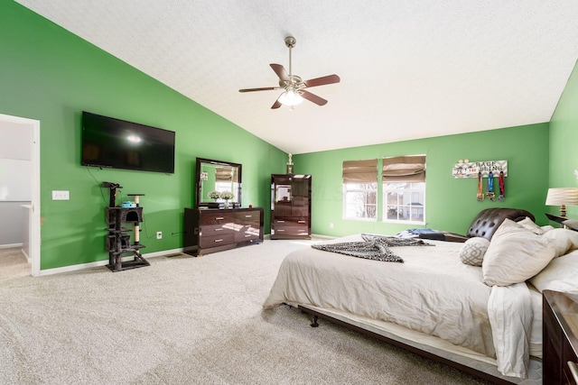 carpeted bedroom featuring a ceiling fan, baseboards, and high vaulted ceiling