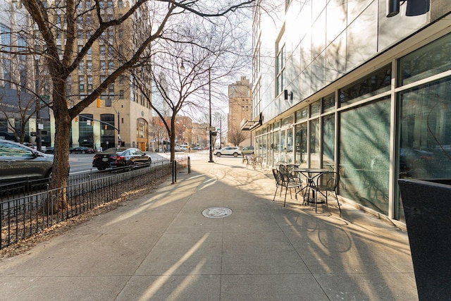 view of road featuring a residential view and sidewalks