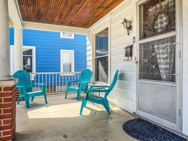 812 S Main St, Urbana, OH 43078 - view of patio featuring covered porch