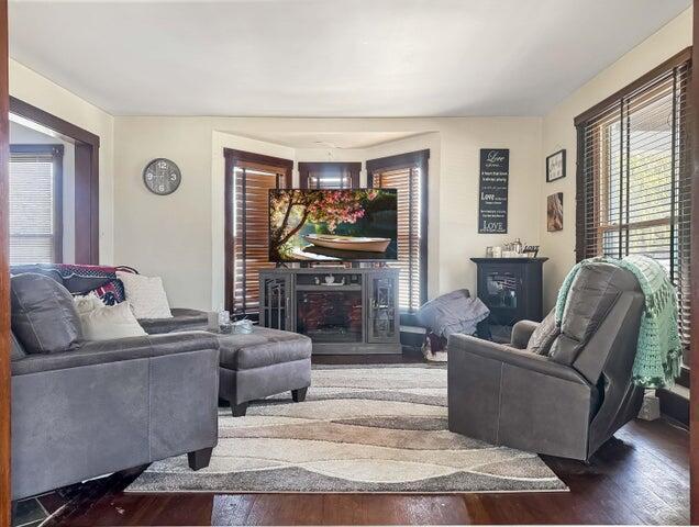 812 S Main St, Urbana, OH 43078 - living area with wood finished floors