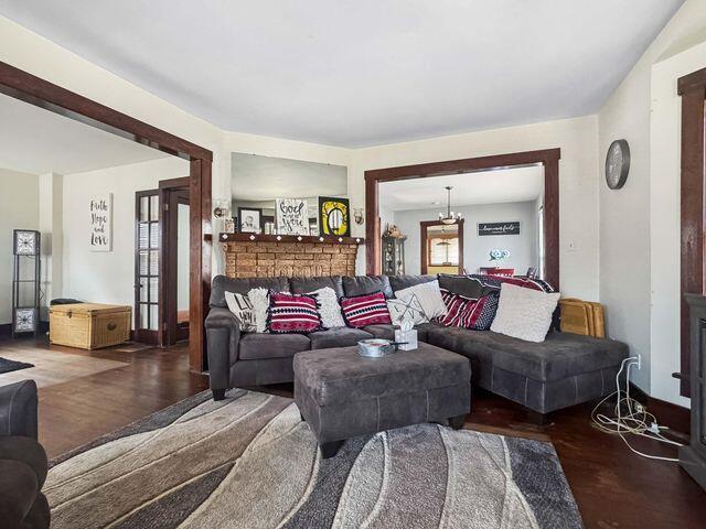 812 S Main St, Urbana, OH 43078 - living area featuring baseboards and wood finished floors