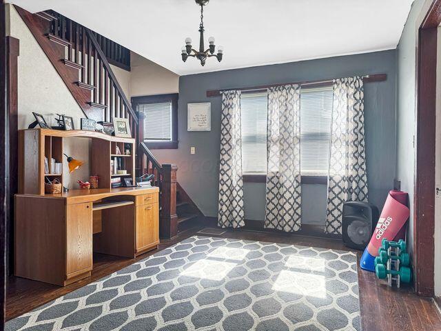 812 S Main St, Urbana, OH 43078 - office featuring wood finished floors and a chandelier