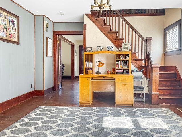 812 S Main St, Urbana, OH 43078 - interior space with baseboards and wood finished floors