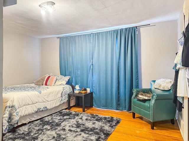 812 S Main St, Urbana, OH 43078 - bedroom featuring wood finished floors