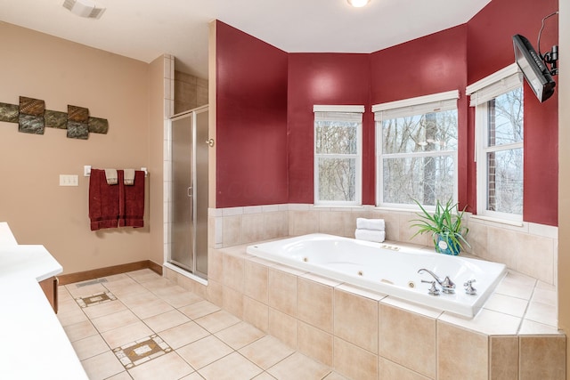 bathroom featuring visible vents, a tub with jets, a stall shower, and tile patterned flooring