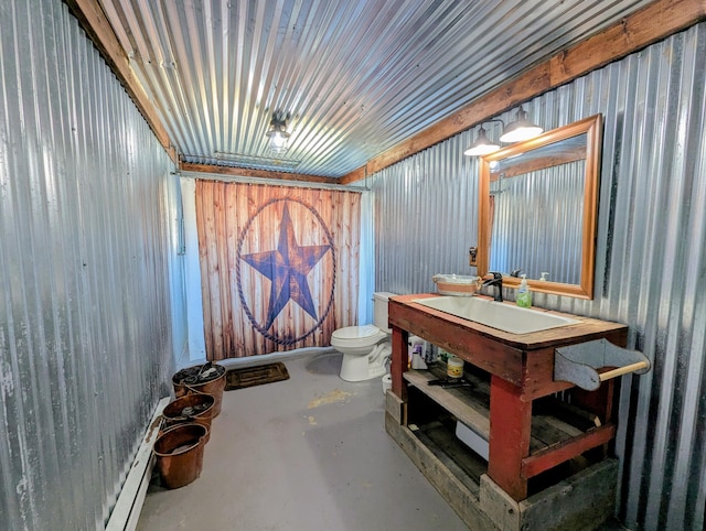 half bathroom with vanity, toilet, and concrete floors