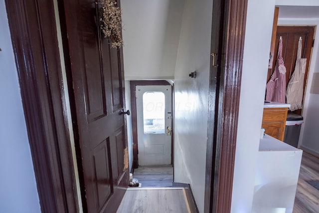 doorway to outside with wood finished floors