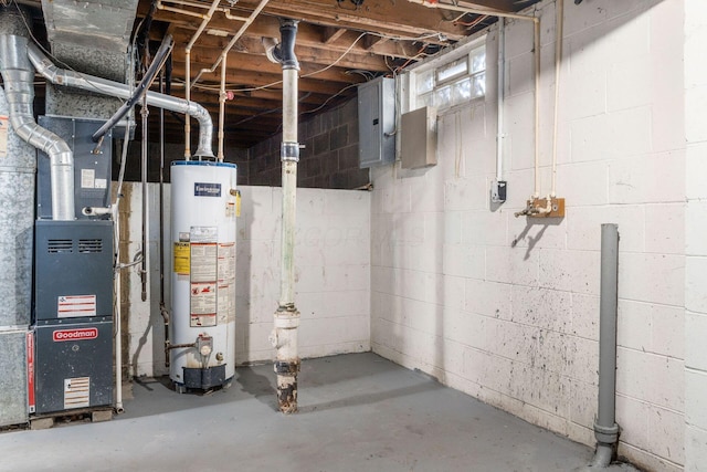 basement with water heater, heating unit, and electric panel