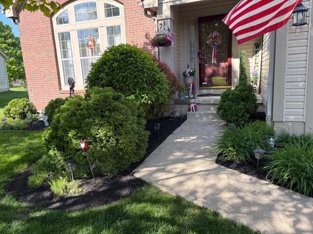 6324 Rossmore Ln, Canal Winchester, OH 43110 - property entrance featuring brick siding
