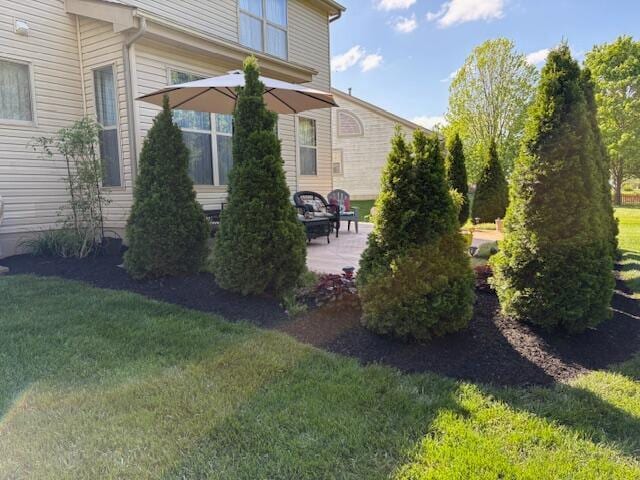 6324 Rossmore Ln, Canal Winchester, OH 43110 - view of property exterior with a yard and a patio