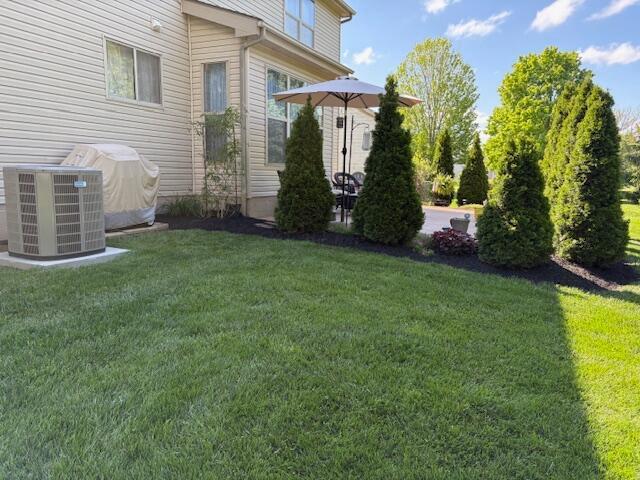 6324 Rossmore Ln, Canal Winchester, OH 43110 - view of grassy yard with cooling unit