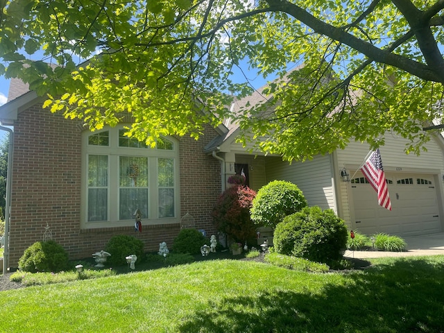 6324 Rossmore Ln, Canal Winchester, OH 43110 - view of property hidden behind natural elements with brick siding and a front yard