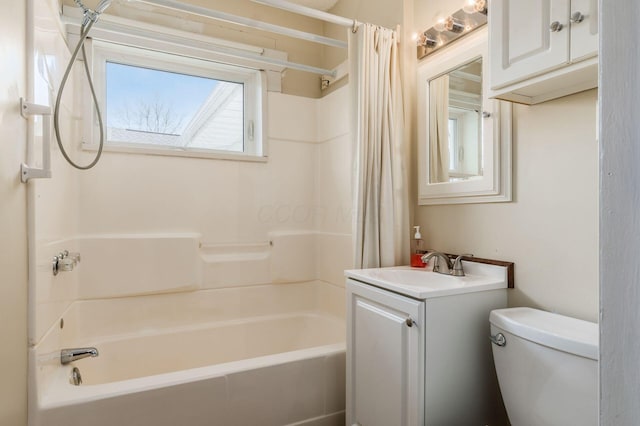 full bathroom with vanity, toilet, and shower / tub combo