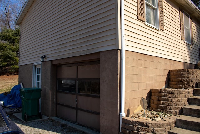 view of home's exterior with a garage