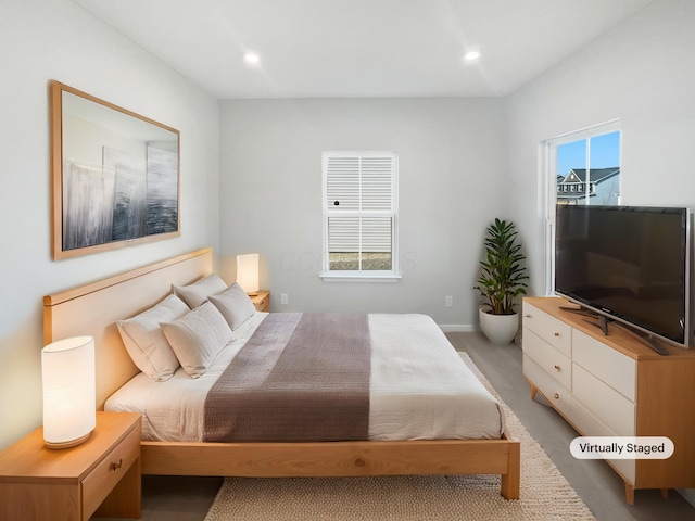 bedroom featuring recessed lighting