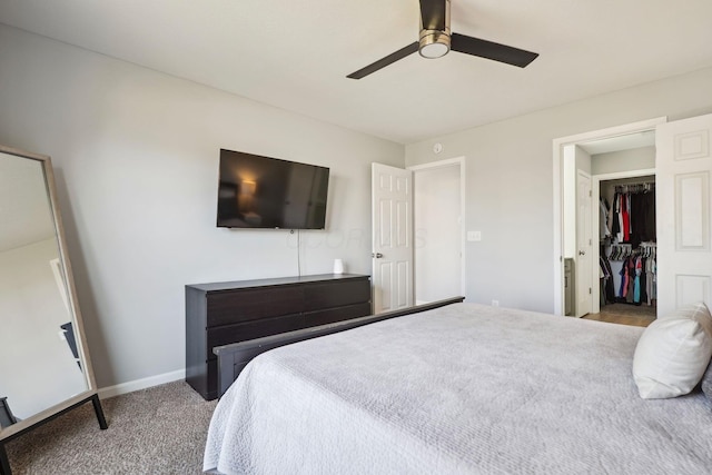 bedroom with baseboards, carpet floors, and ceiling fan