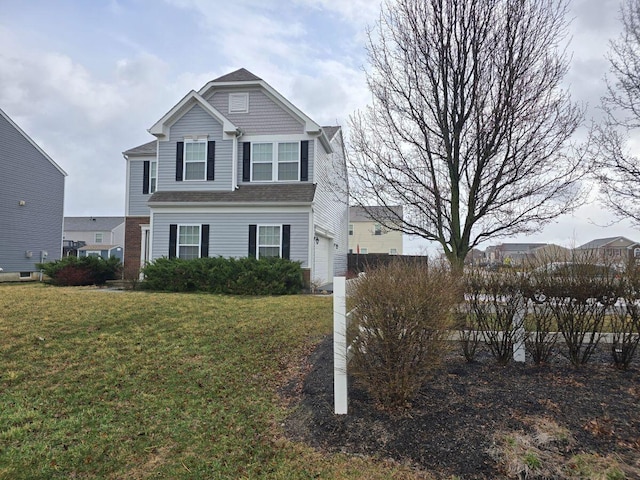 view of front facade with a front lawn