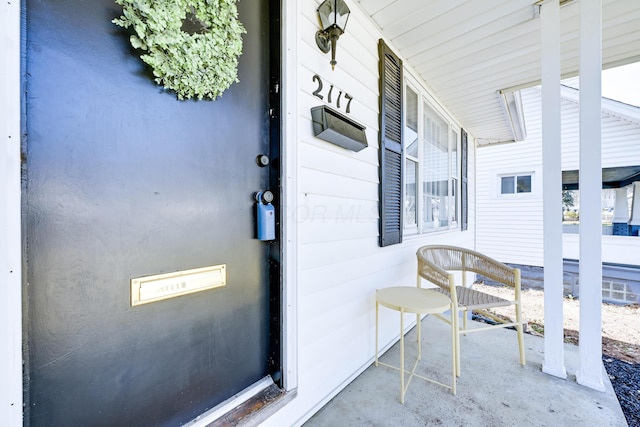 entrance to property with a porch