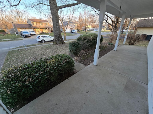 view of yard featuring a residential view