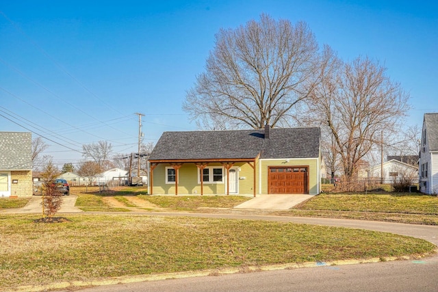 view of front of house with a shingled roof, fence, concrete driveway, a front yard, and a garage