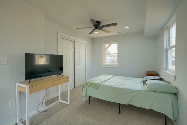 bedroom with visible vents, recessed lighting, a closet, carpet floors, and ceiling fan