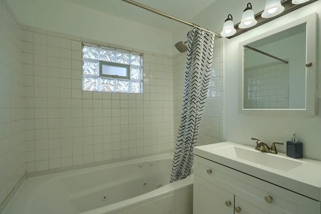 full bath with vanity and a combined bath / shower with jetted tub