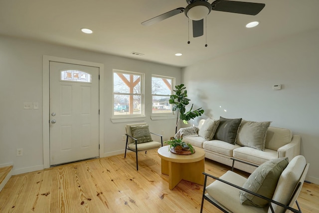 living area featuring visible vents, recessed lighting, light wood-type flooring, and ceiling fan