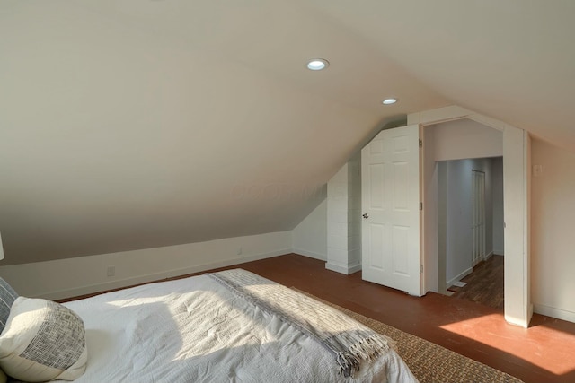 bedroom featuring recessed lighting, baseboards, and vaulted ceiling