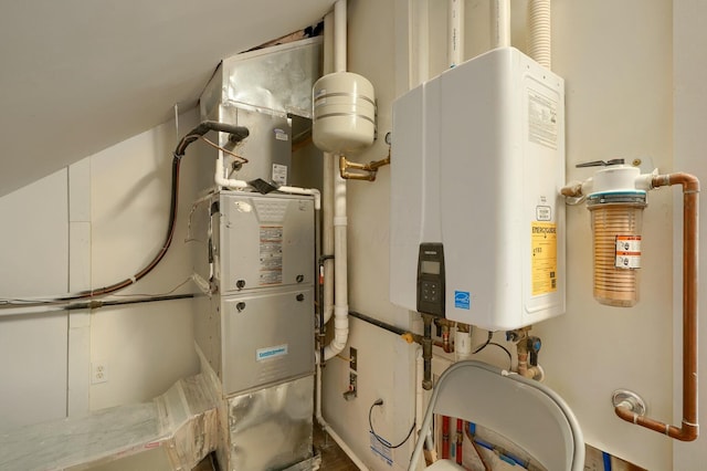 utility room with tankless water heater