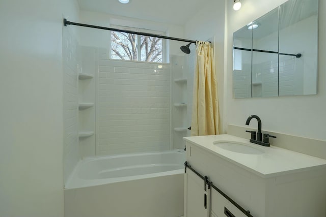 bathroom with shower / bath combination with curtain and vanity