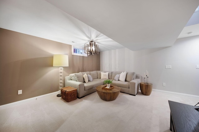 living area with light carpet, a chandelier, and baseboards