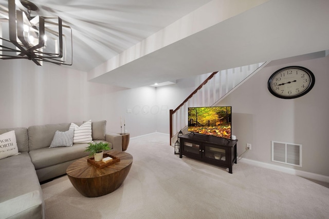 carpeted living room featuring visible vents, baseboards, an inviting chandelier, and stairs