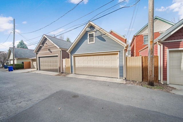 detached garage with fence