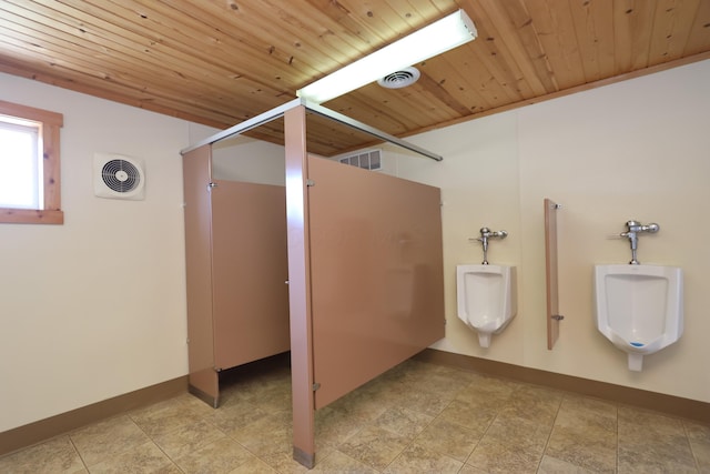 bathroom with visible vents, wood ceiling, and walk in shower