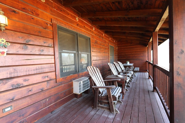 deck with a wall unit AC