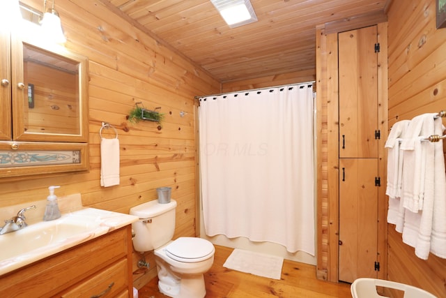 full bathroom featuring wood walls, wooden ceiling, toilet, and wood finished floors