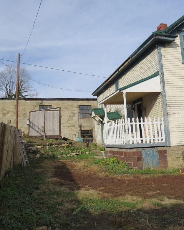 view of yard with covered porch