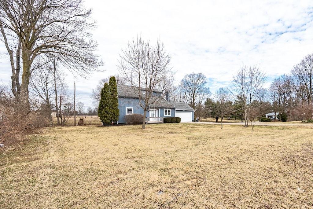 view of yard with a garage