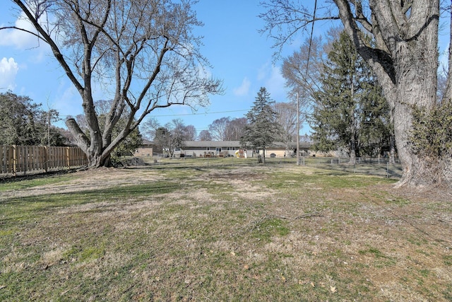 view of yard with fence