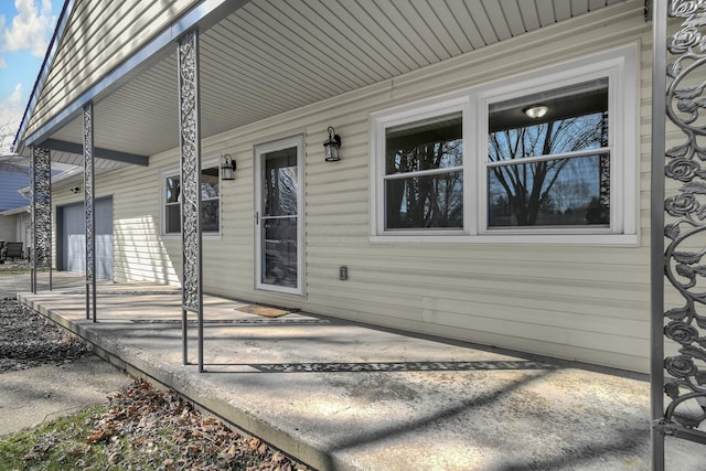 doorway to property featuring a porch