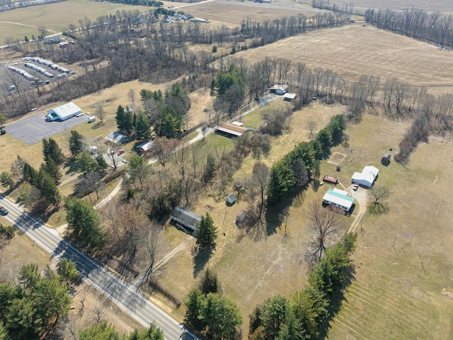 birds eye view of property featuring a rural view