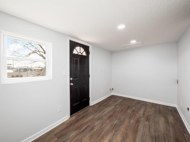 entryway featuring recessed lighting, baseboards, and dark wood-style flooring